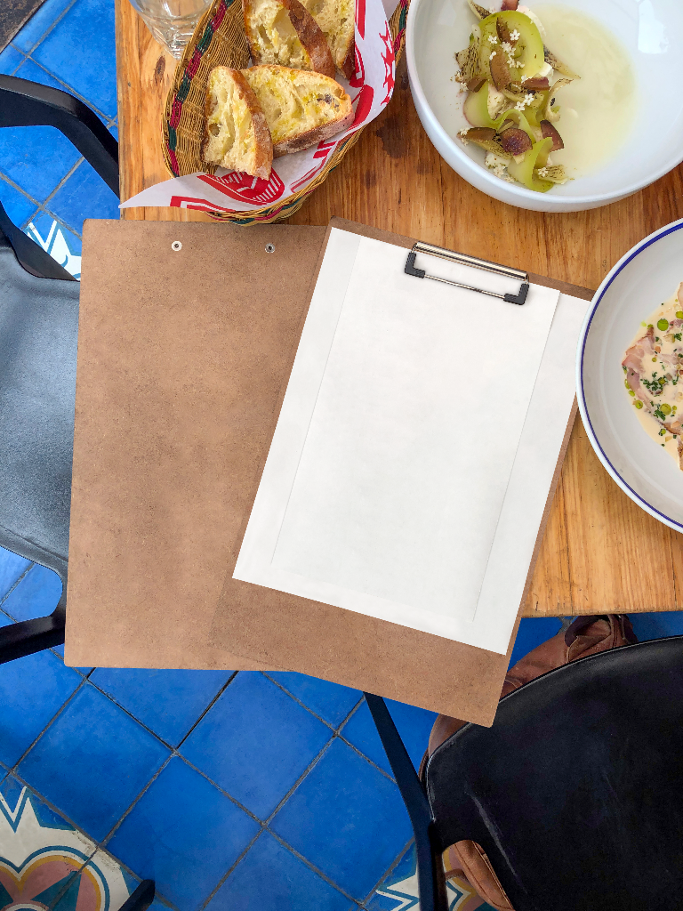 Flyer 2056 — On clipboard mockup surface