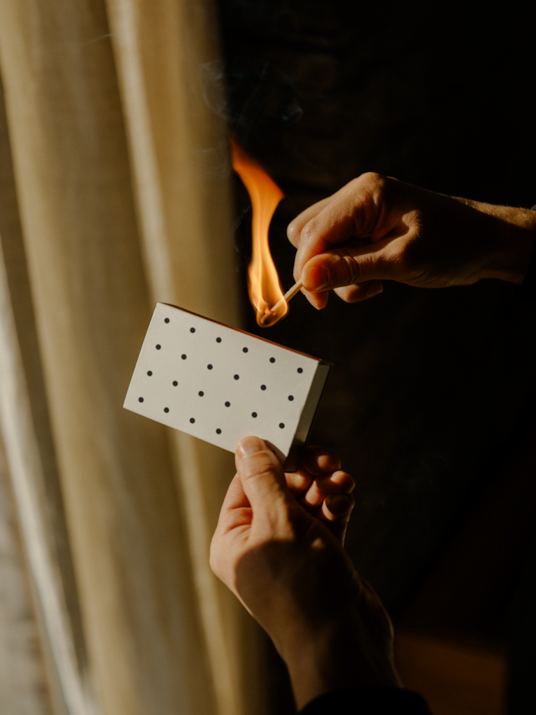 Matches 01 — Matchbox, held mockup surface