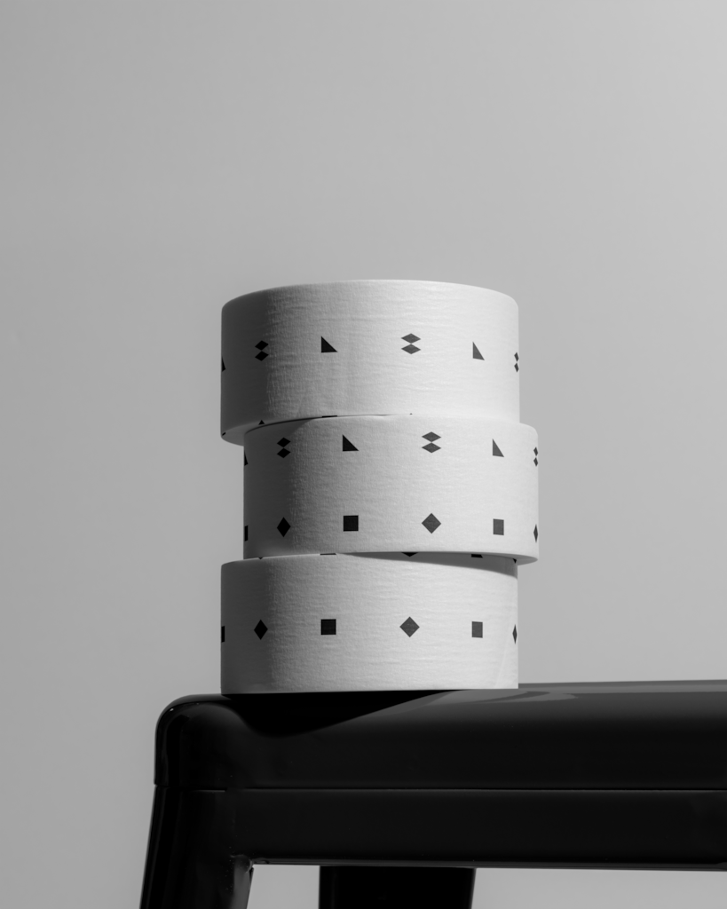Tape 04 — Stack, on chair mockup surface
