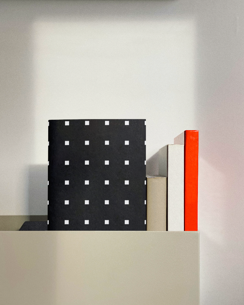 Booklet 2157 — In hanging shelf mockup surface