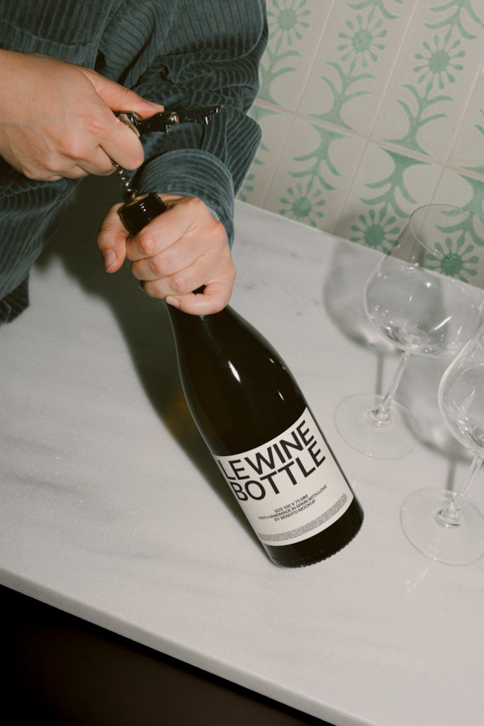 LB25 W21 Le Wine Bottle Mockup — Held mockup surface