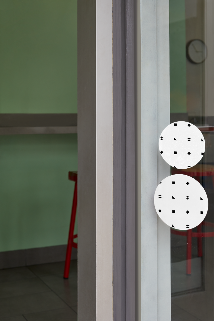 Sticker 1710 — On storefront window mockup surface