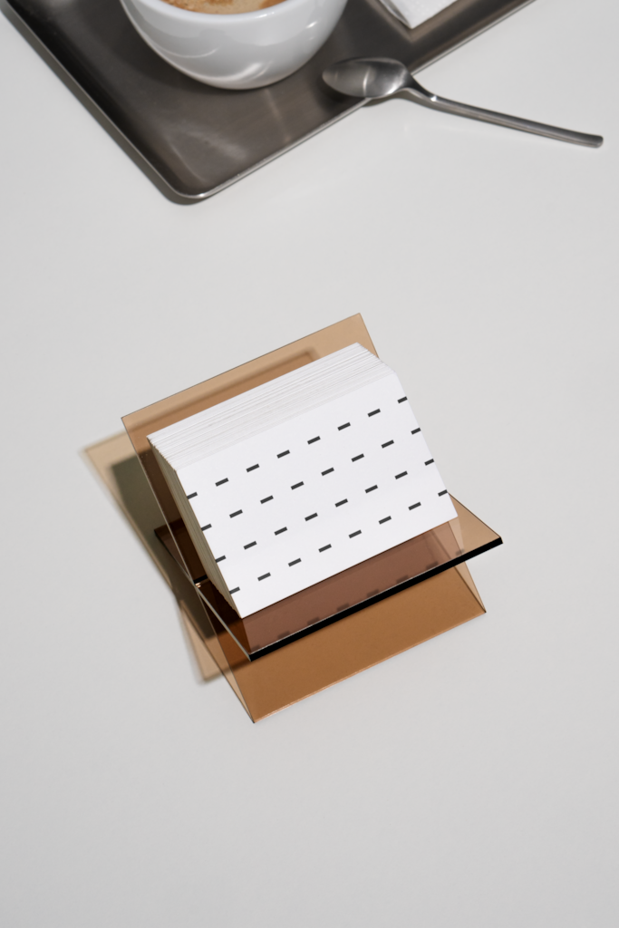 EY Business Card Mockup — In holder mockup surface