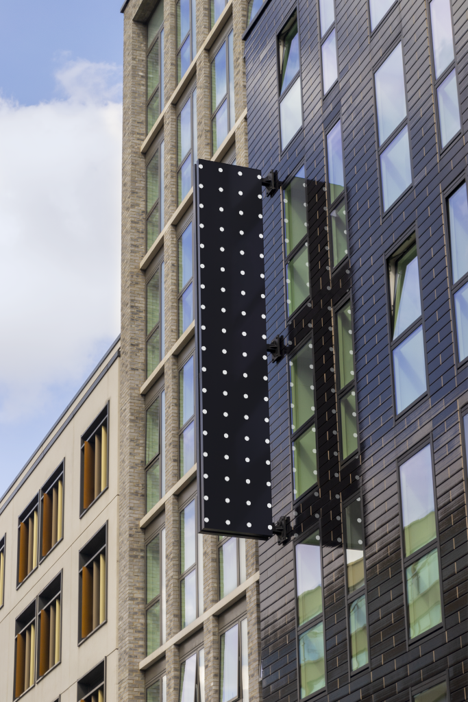 Sign 2302 — On building mockup surface