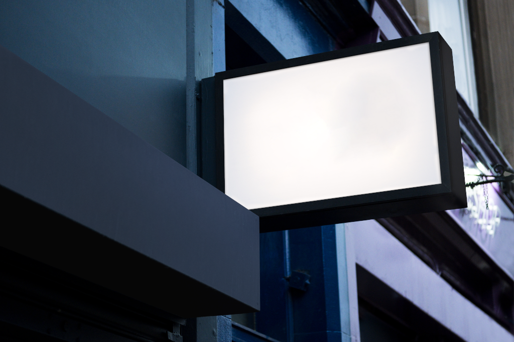 Sign 2089 — Backlit, on building mockup surface