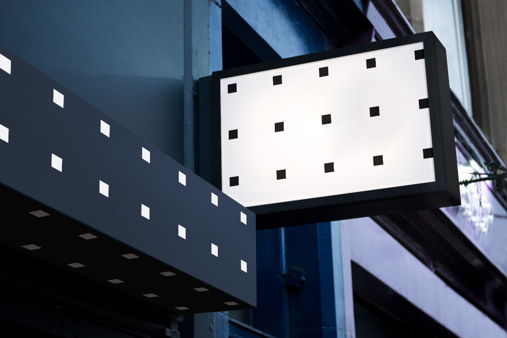 Sign 2089 — Backlit, on building mockup surface