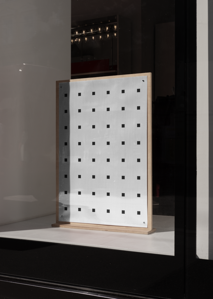 Poster 18 — Freestanding, in window mockup surface