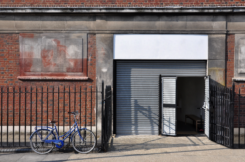 Sign 2066 — On building mockup surface