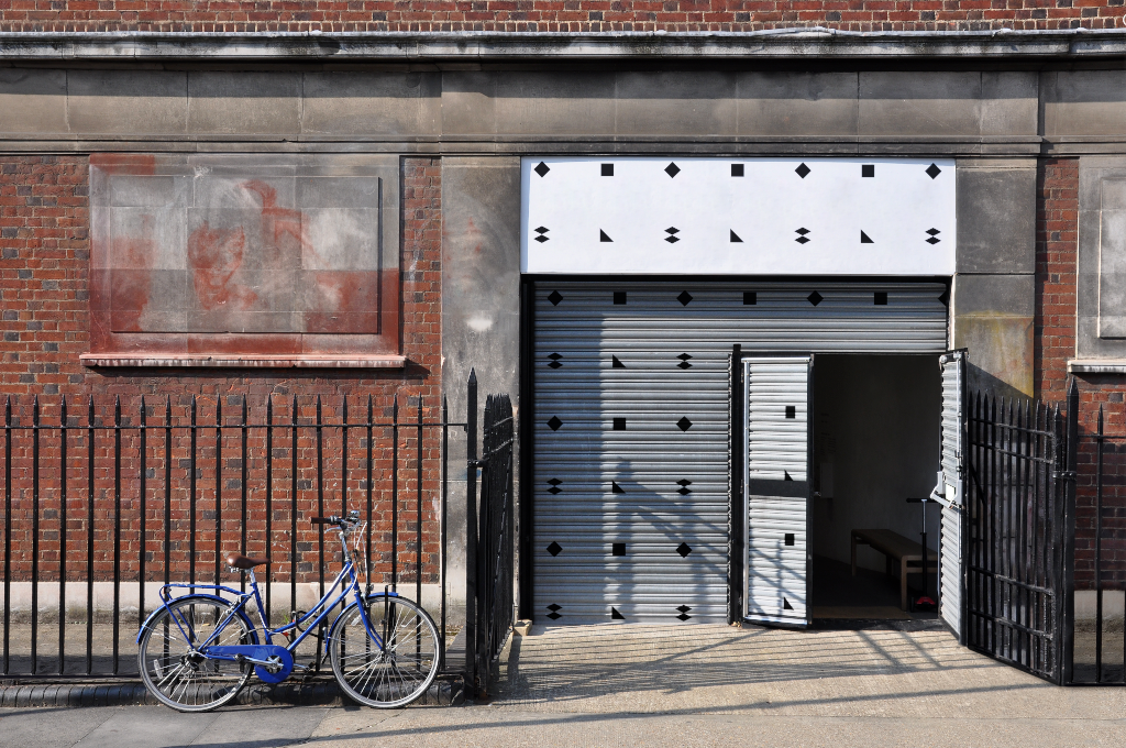 Sign 2066 — On building mockup surface