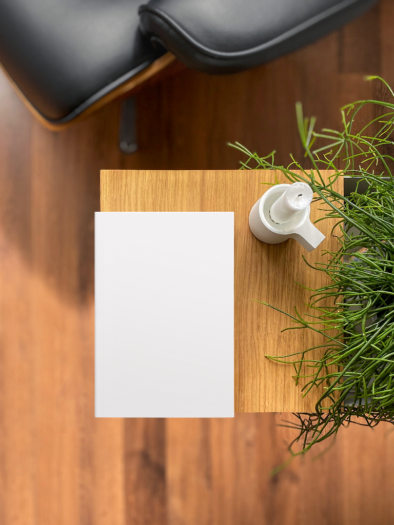 Book 2159 — Softcover, on table mockup surface