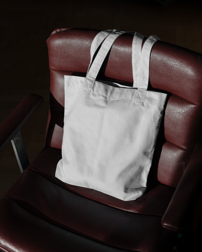 Tote Bag 04 — Tote, on chair mockup surface