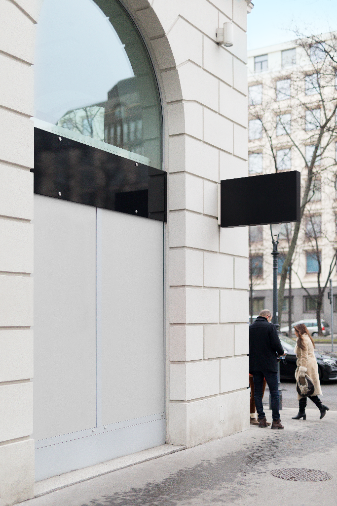 Sign 2121 — Mounted, on building mockup surface