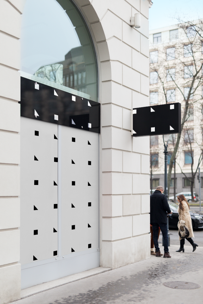 Sign 2121 — Mounted, on building mockup surface