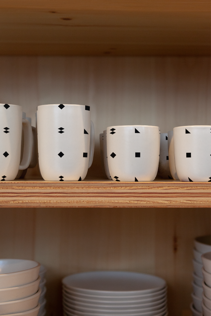 Cup 1479 — Mugs, on shelf mockup surface