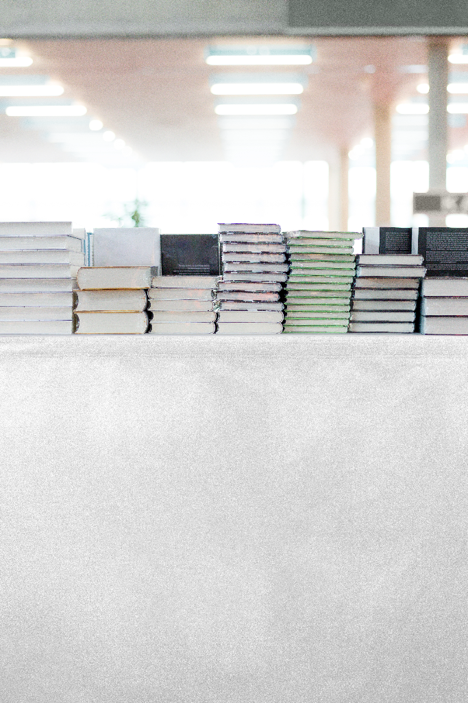 Banner 2108 — On table, with books mockup surface