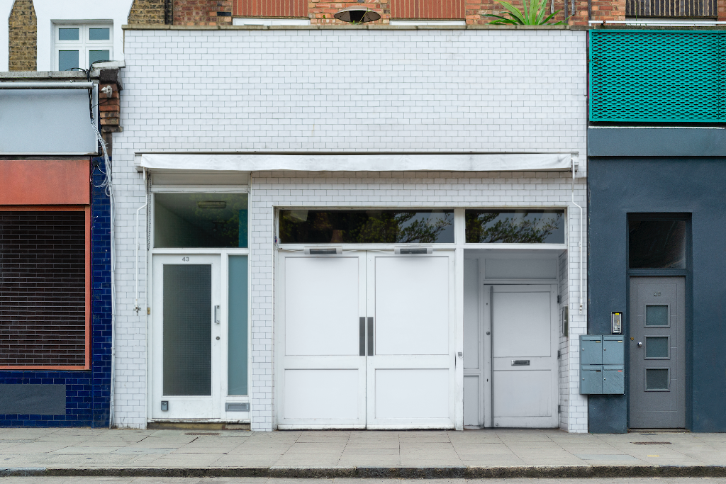 Storefront 2332 — Front, with painted brick mockup surface