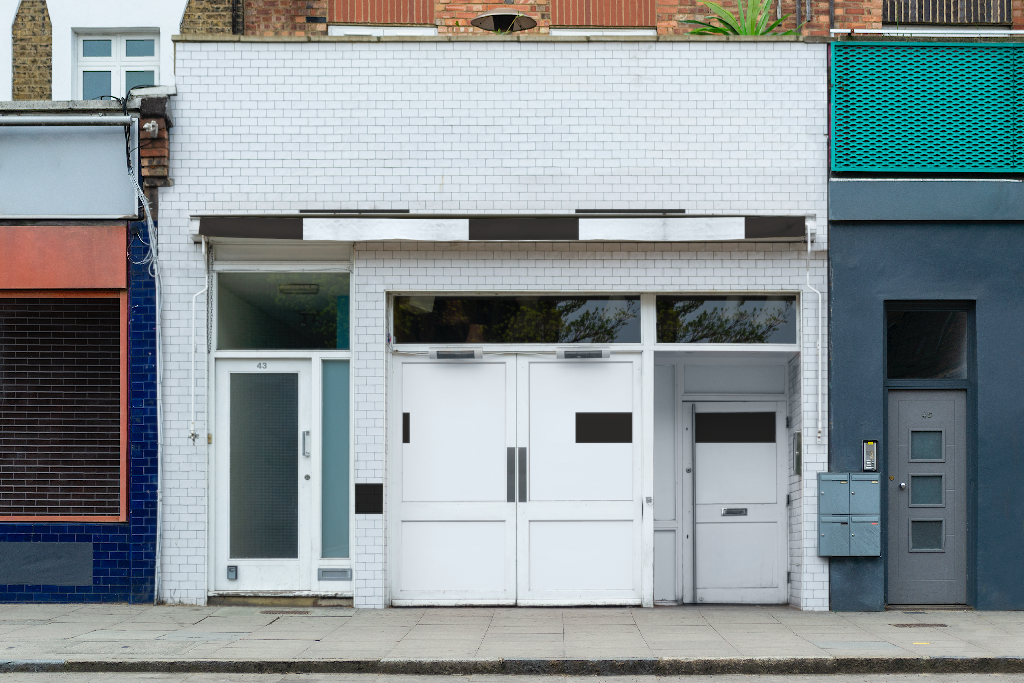 Storefront 2332 — Front, with painted brick mockup surface