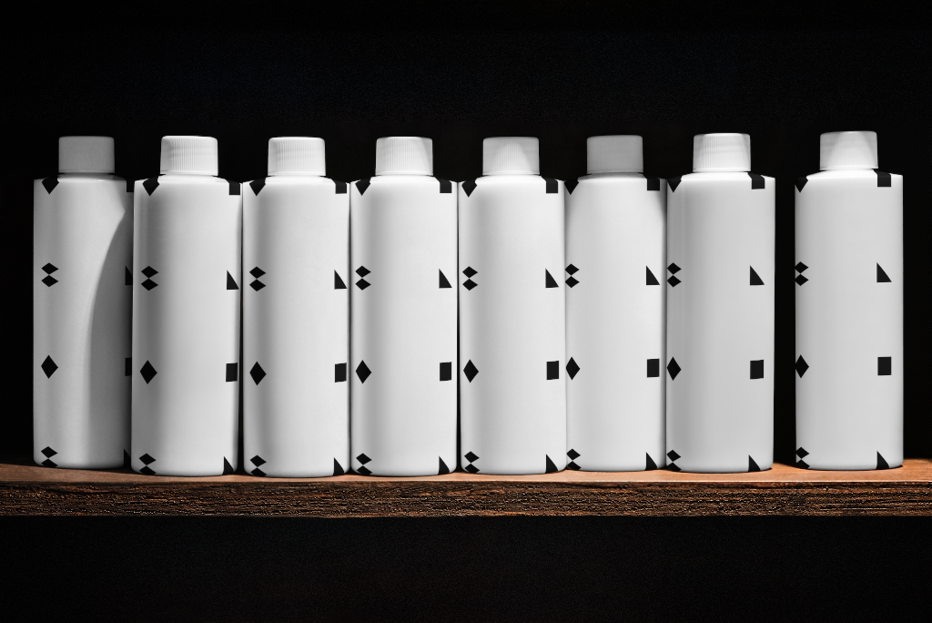 Bottle 5163 — Multiple, on shelf mockup surface