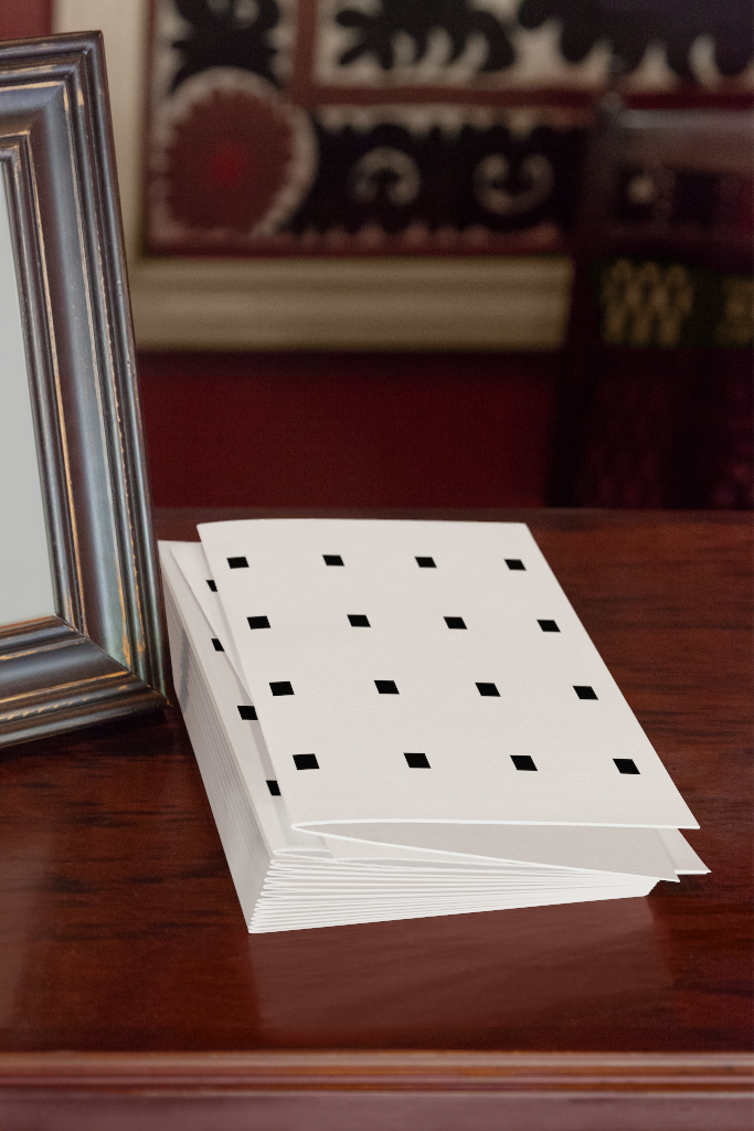 Booklet 1514 — Stack, on table mockup surface