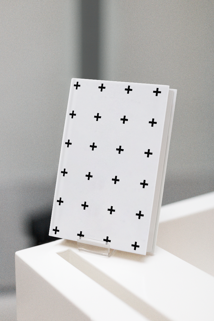 Book 2109 — Hardcover, no jacket, on stand mockup surface