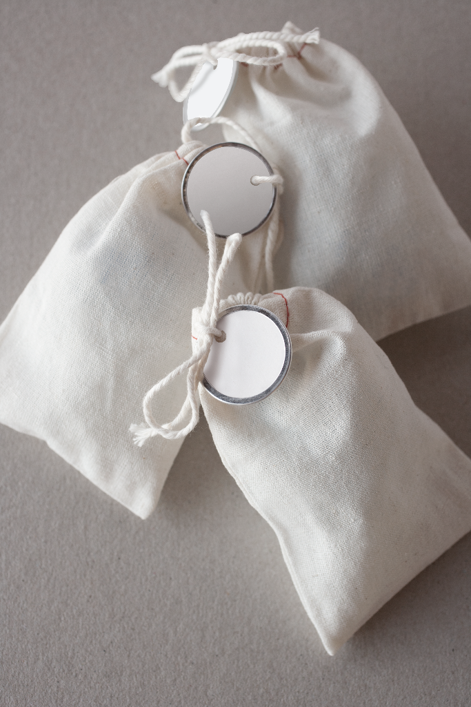 Tag 2464 — Multiple, on canvas bags mockup surface