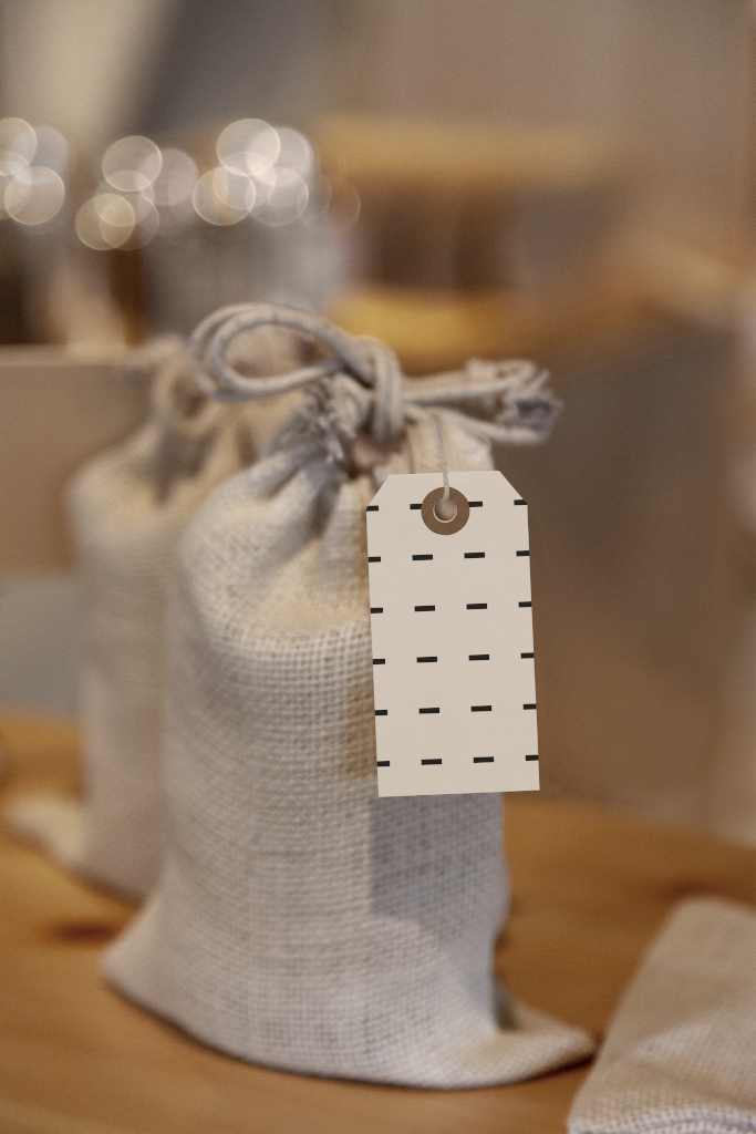 Tag 1519 — Hanging, on bag mockup surface