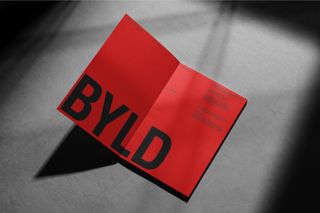 Magazine 06 — Open, on concrete floor mockup surface